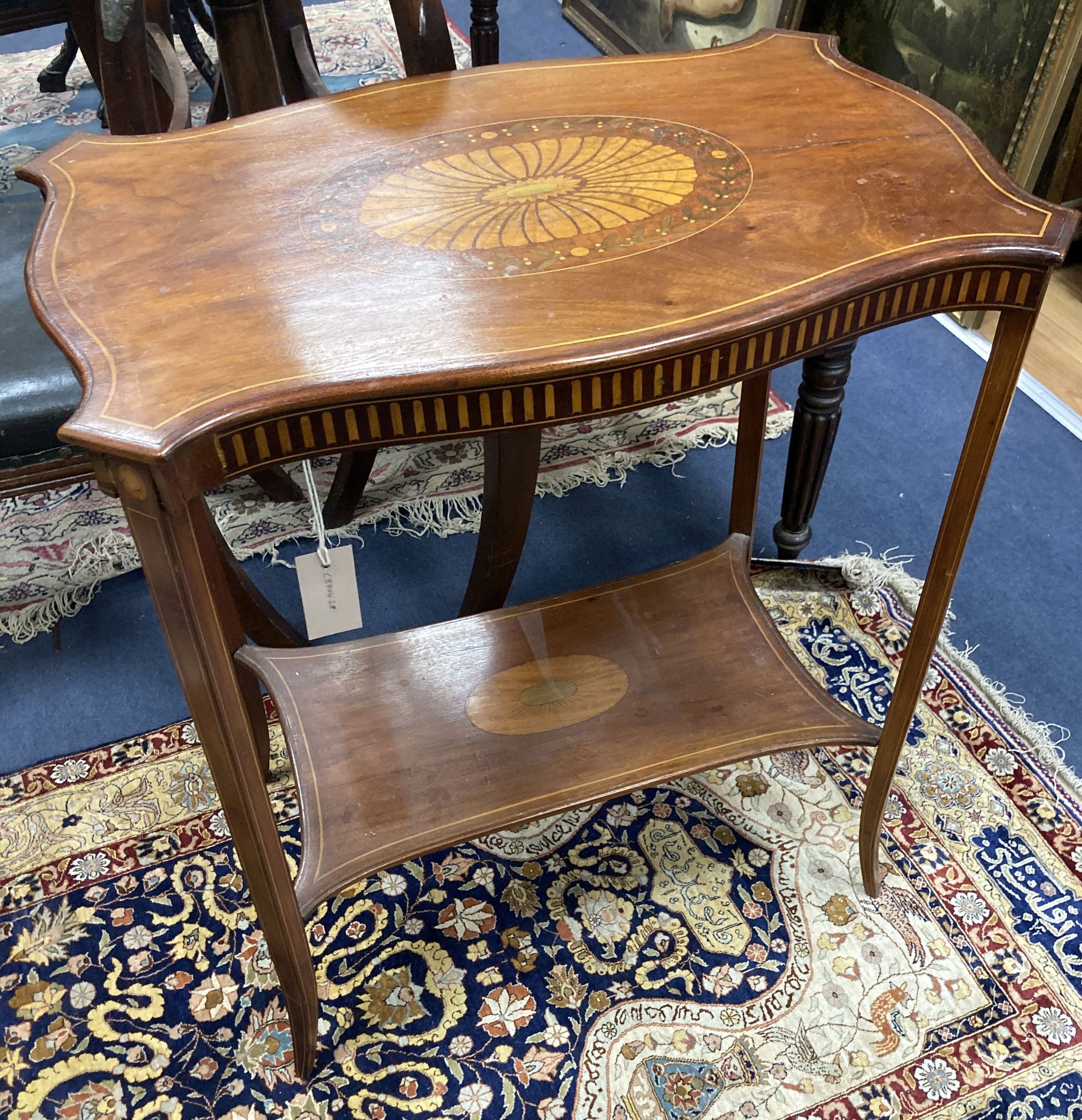 An Edwardian satinwood inlaid mahogany two tier occasional table, in Sheraton style, width 64cm, depth 40cm, height 74cm